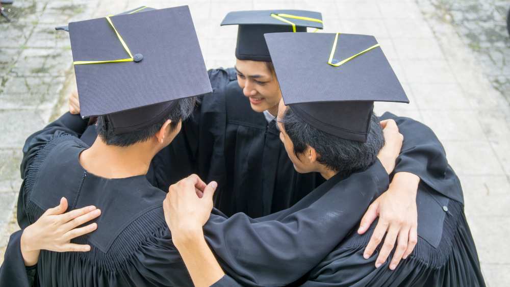 University students celebrating graduation.